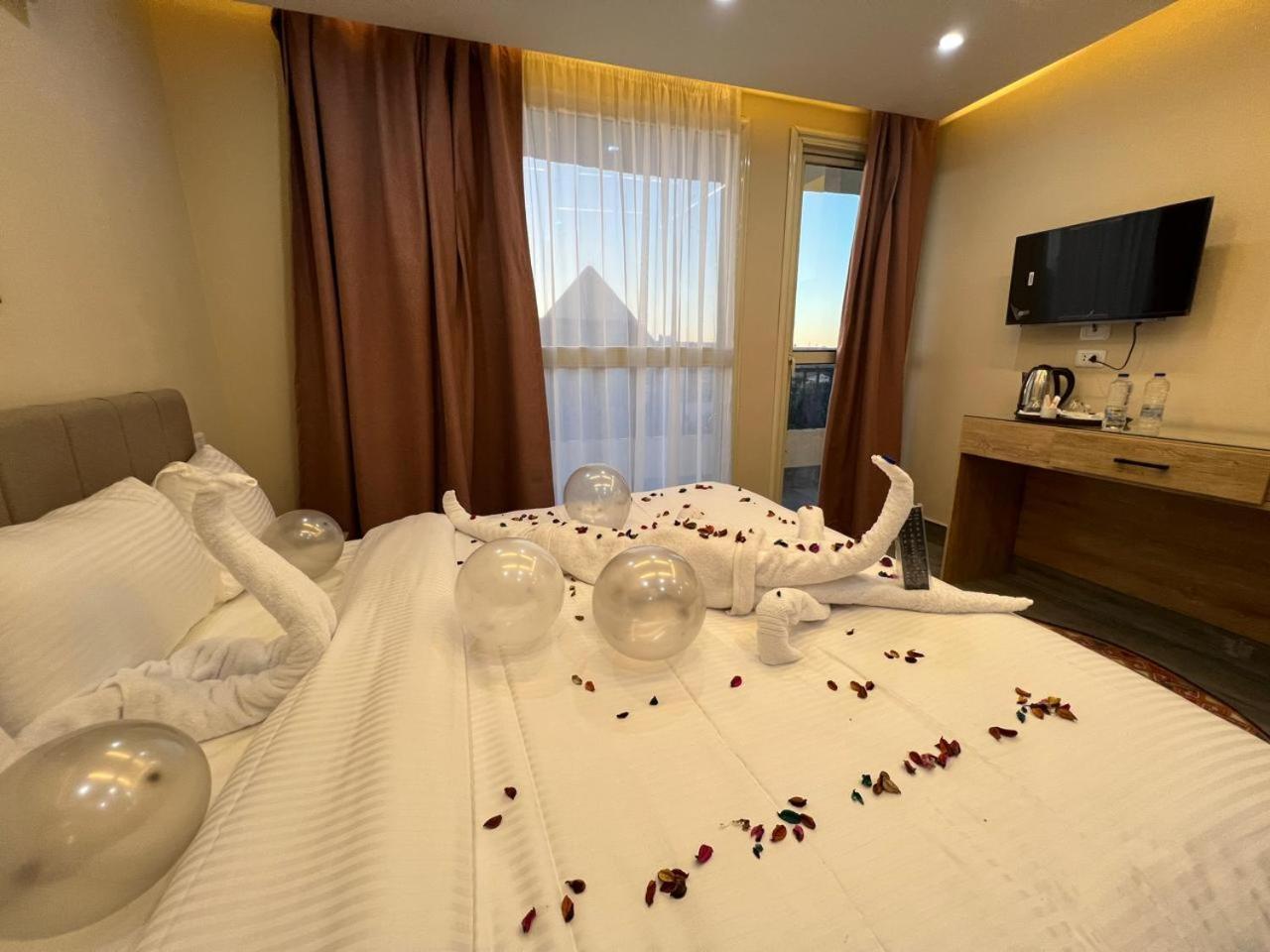 Pyramids Hotel Kafret el-Gabal Extérieur photo